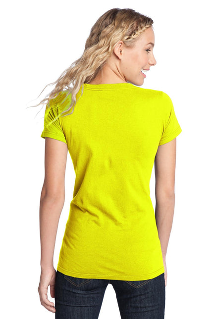 District Women's Fitted The Concert Tee in neon yellow, showcasing a close-up of the vibrant, fitted T-shirt fabric and design.